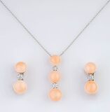 A Coral Diamond Jewellery Set with Pendant and Pair of Earrings