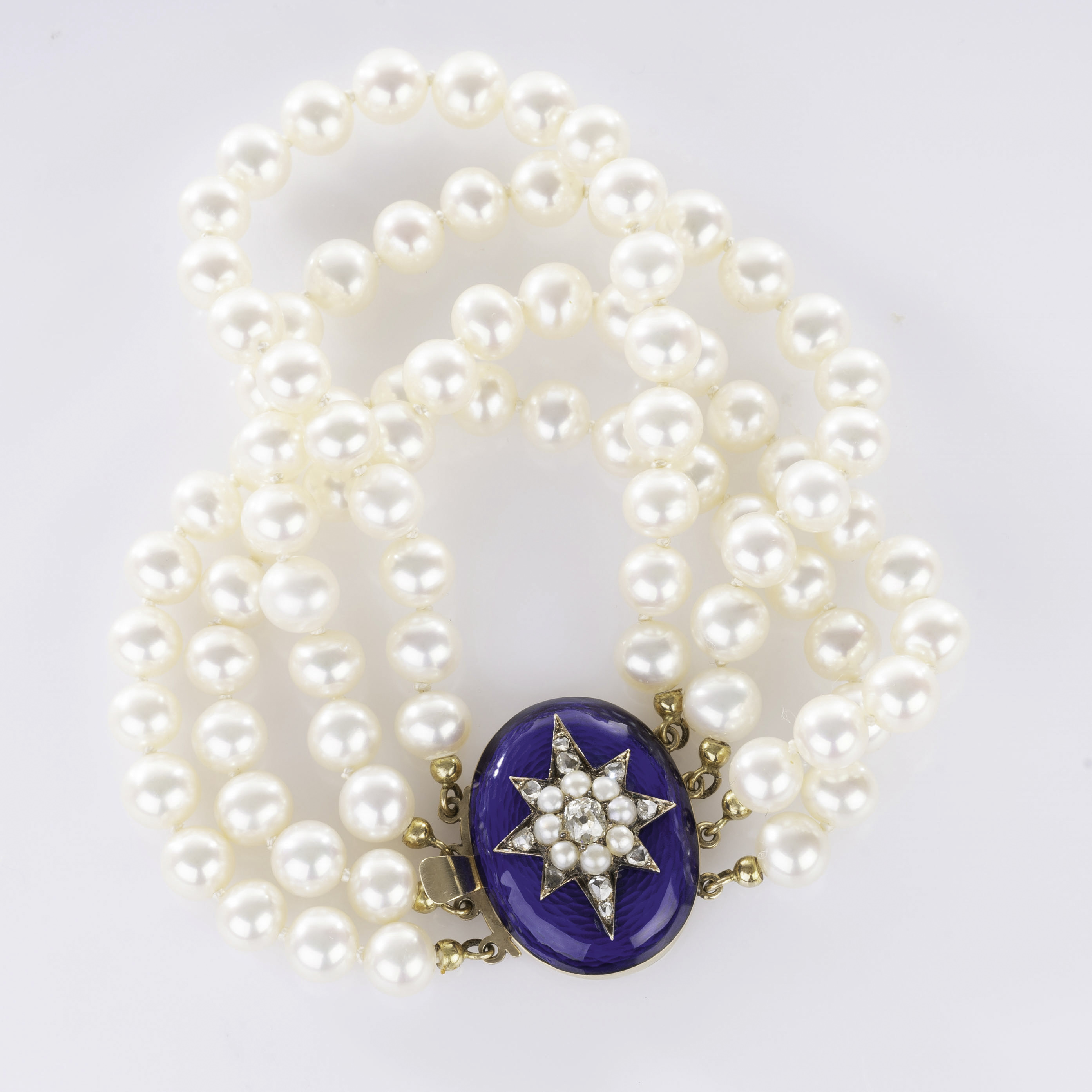 An Art-Nouveau Diamond Clasp on Pearl Bracelet