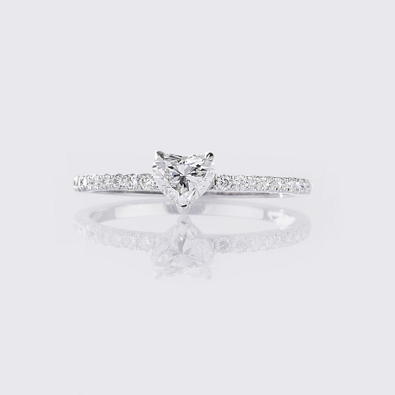 A Solitaire Heart Diamnd Ring with Diamonds