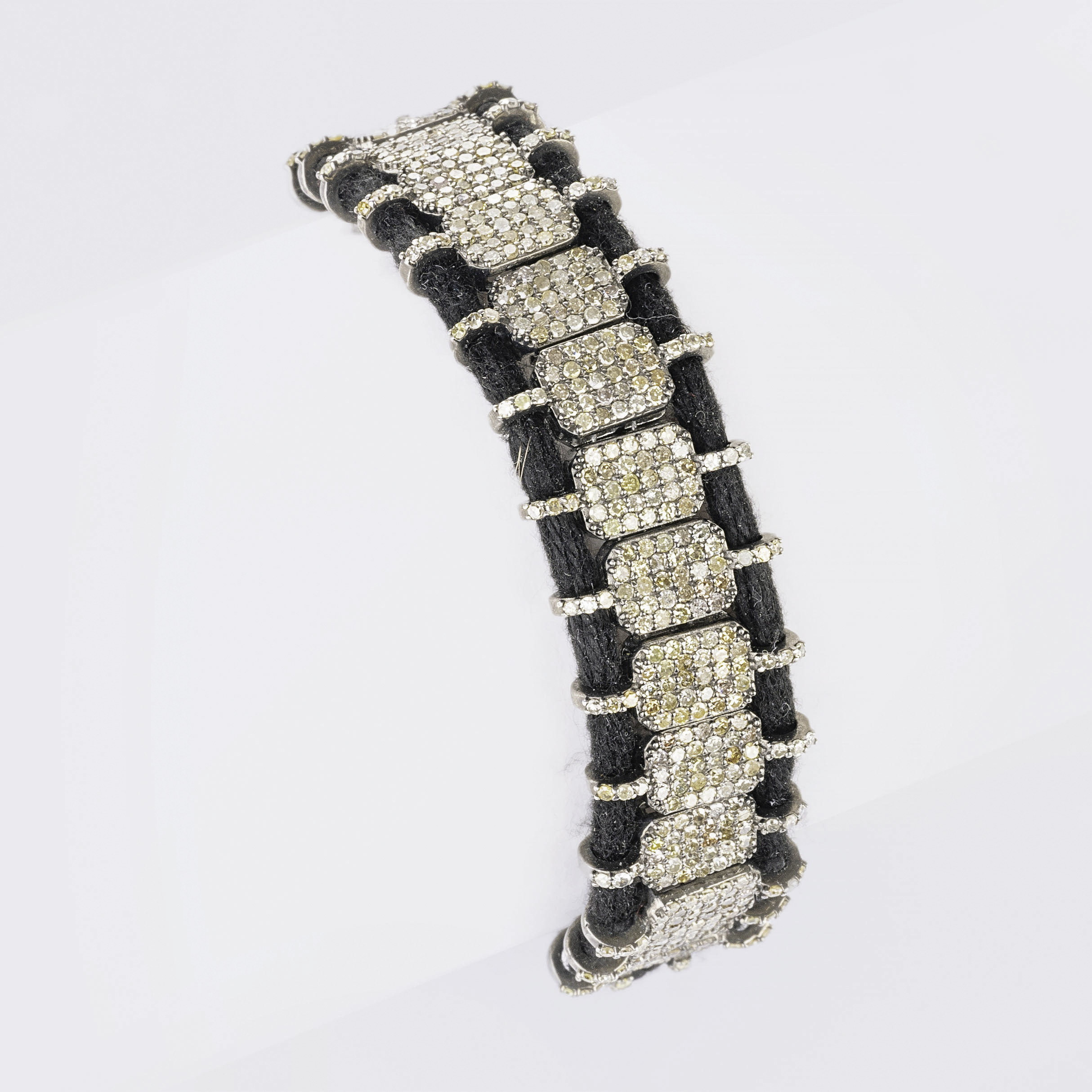 A Black Woven Bracelet with Diamonds