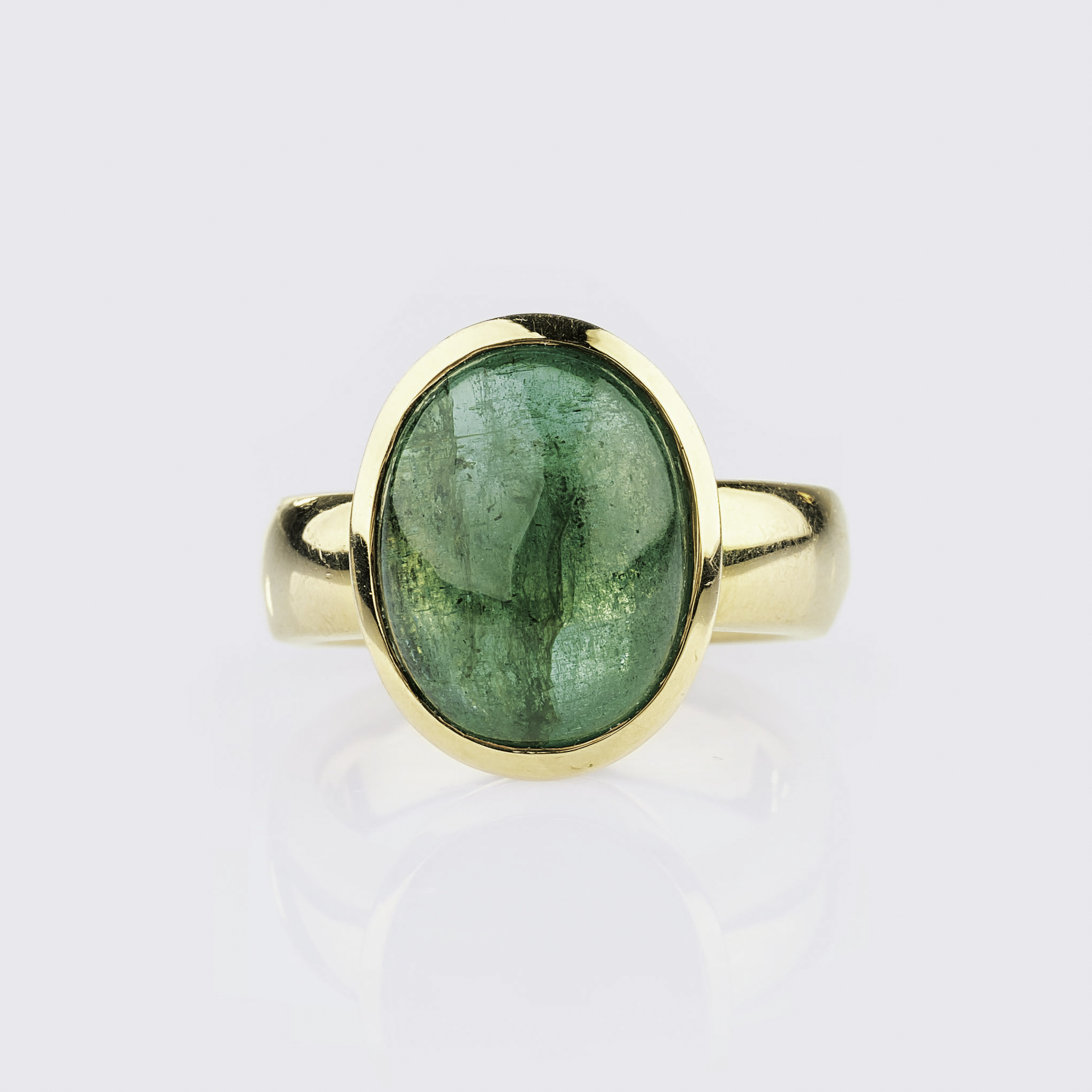 An Emerald Cabochon Ring