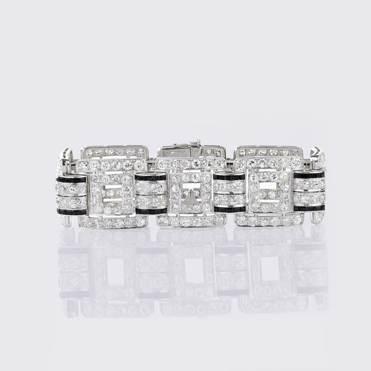 A highcarat Art-déco Diamond Bracelet with colour contrast Onyx stones