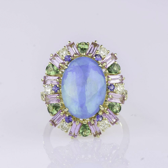 A colour intensive Opal Cocktailring with Precious Stones