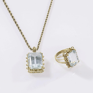 A Vintage Aquamarine Jewellery Set with Ring and Pendant on Necklace