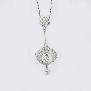 An Art Nouveau Diamond Pendant on Necklace