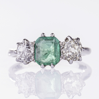 An Emerald Ring with Old Cut Diamonds