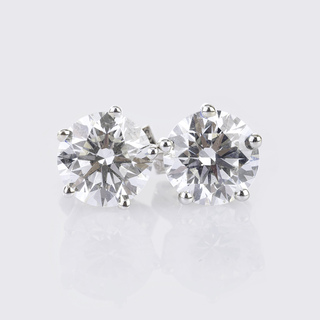 A Pair of rare-white Solitaire Diamond Earstuds